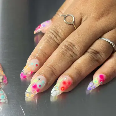 blooming gel nails with diamond rhinestone accents