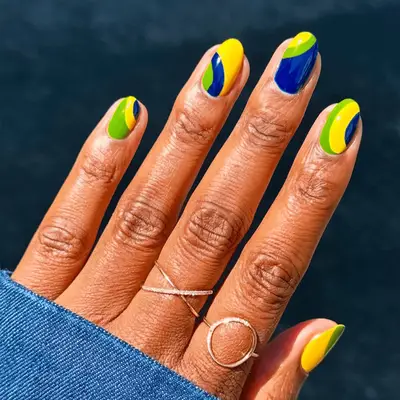 blue, green, and yellow nails 