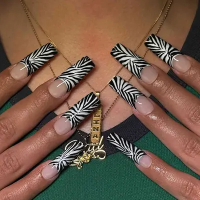 black and white zebra print French tips nails 