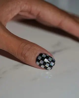 black and silver checkerboard disco nails 