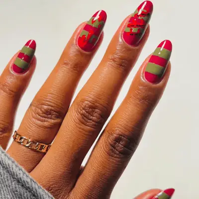 Red and green striped nails with blood drips