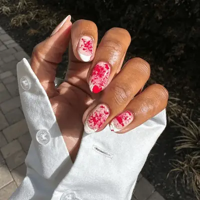 French manicure with blood splatter detail