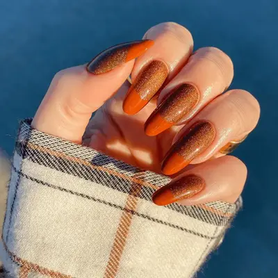 Solid Pumpkin Spice mani against a white background