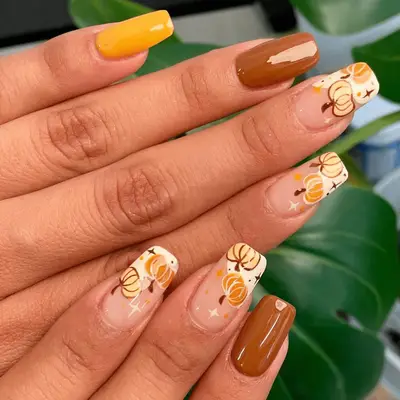 Abstract Pumpkin Spice Nails With Negative Space Accents