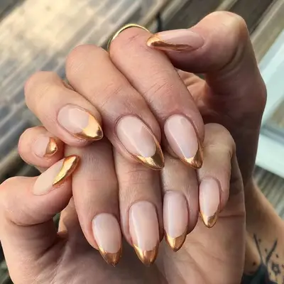 Metallic copper French manicure