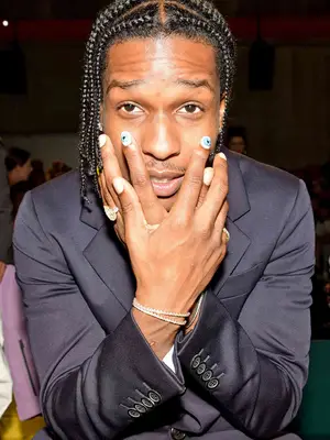 ASAP Rocky in the front row (Photo by Swan Gallet/WWD/Penske Media via Getty Images)