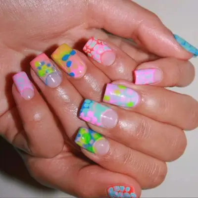 Acid neon croc print nails.