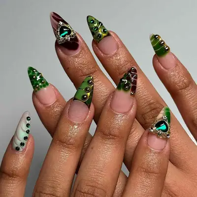 green and brown croc nail design with charms and gems 