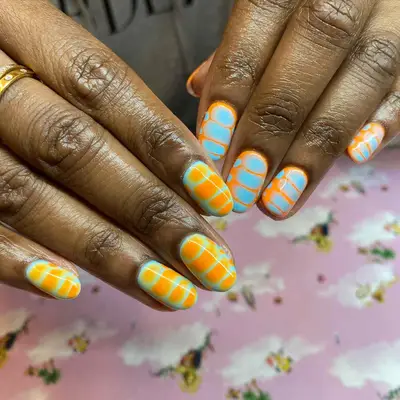 orange and blue croc nails
