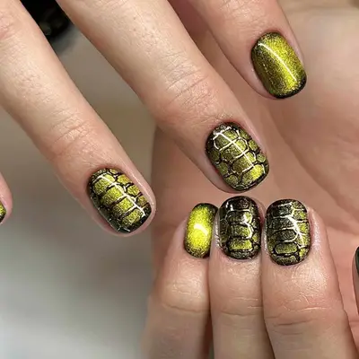chrome, cat-eye nails with croc accents