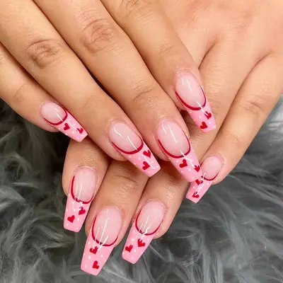 pink and red polka dot and heart french tip coffin nails