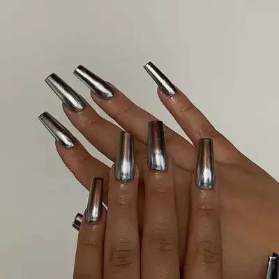 Silver and gold copper ombre nails.