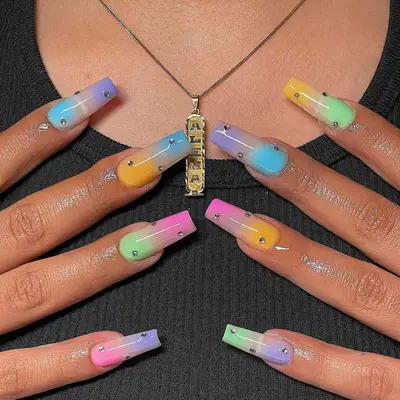 Pastel nails with crystals.