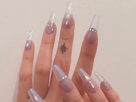long clear coffin nails with gemstone accents