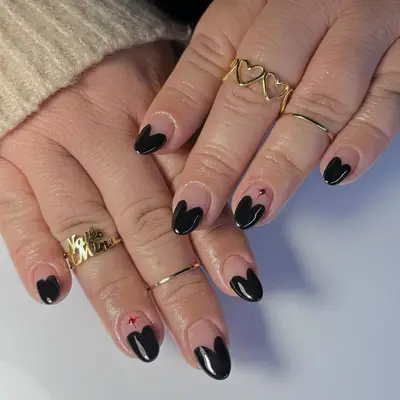 French nails with heart-shaped tips. 