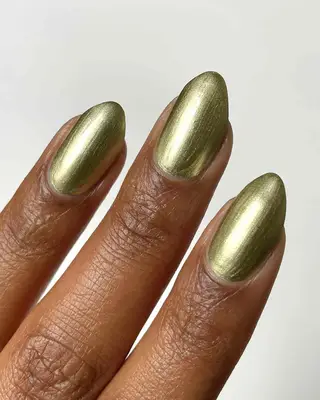 A solid gold chrome manicure 