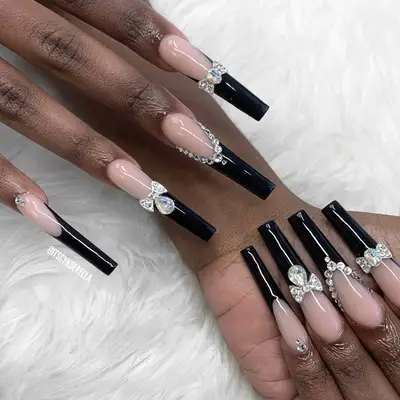black french manicure with rhinestones and rhinestone bows