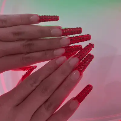 gold bedazzled french manicure