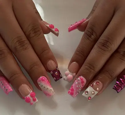 different styles of pink rhinestone French nails