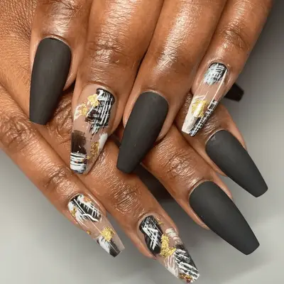 Matte black long nails with gold, black and white abstract art design