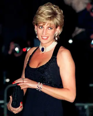Princess Diana wearing a black sleeveless dress with a red manicure