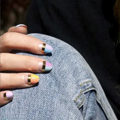 sorbet nails with a solid gold bar