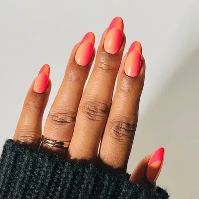 neon pink and peach gradient french tips