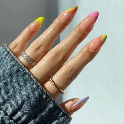 Neon french tip with pastel swirl nails 