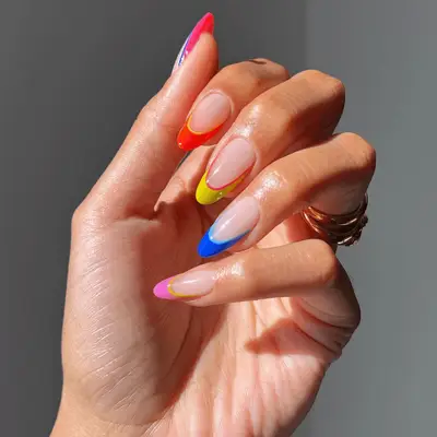 neon French tips in different colors with trim
