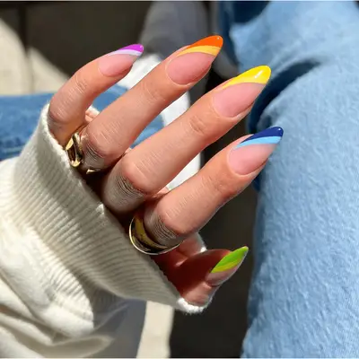 Asymmetrical french tips in multiple neon colors 