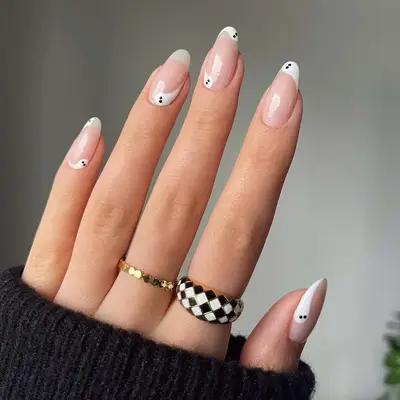 Minimalist Ghost Manicure - MYM Beauty Black and White Halloween Nail Ideas
