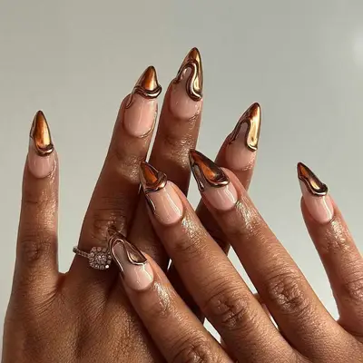 Molten chrome French manicure.