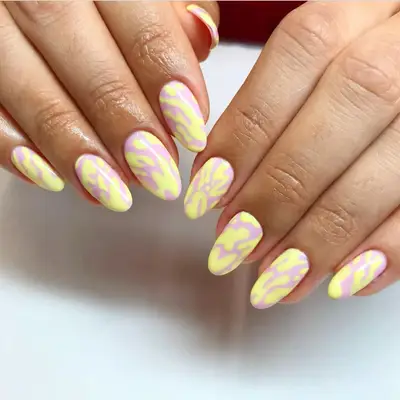 Pink and yellow lava lamp design nails.