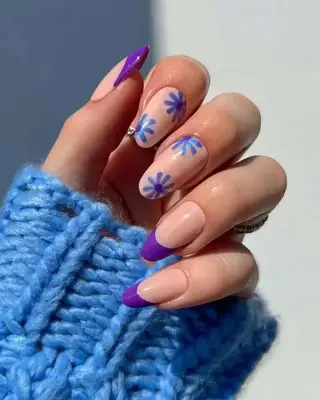 Purple French manicure with simple flower design