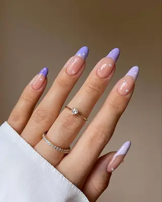 French manicure with purple gradient and pearls