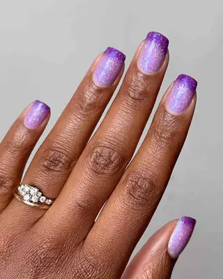 a thermal manicure fading from lilac to deep purple