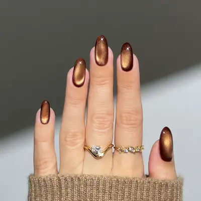 an amber brown glass manicure