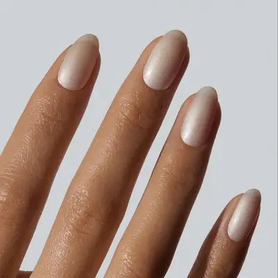 a shimmery ivory manicure