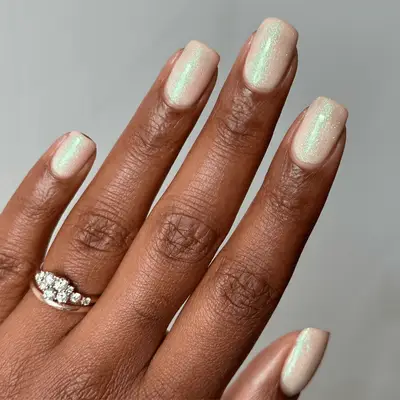 short square tip milky chrome nails that glow in the dark