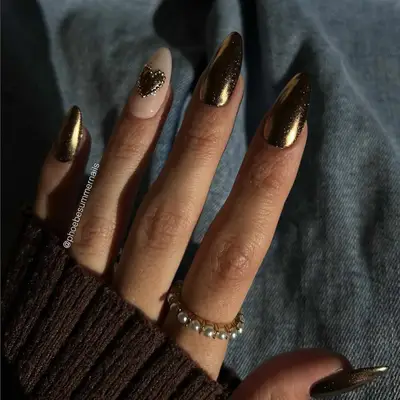 chrome nails with heart accent nail