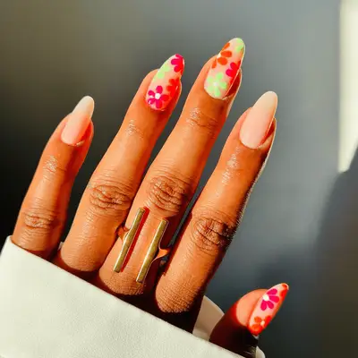 neon watercolor effect nails, plus checkerboard accent nails