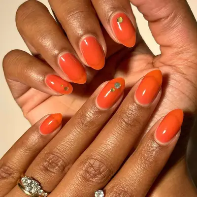 A burnt orange jelly manicure
