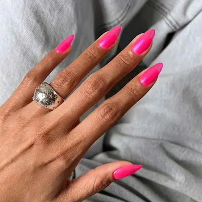 A pink chrome jelly manicure