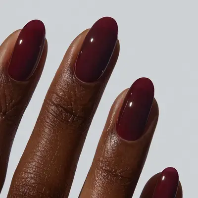 a deep red wine manicure