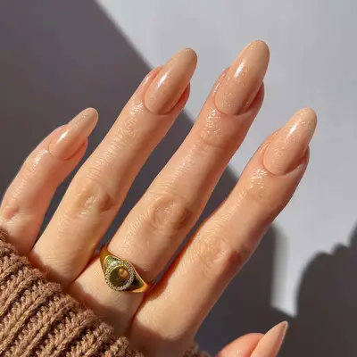 a shimmery neutral manicure