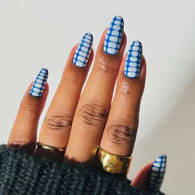 Dark blue and periwinkle crocodile-print nails