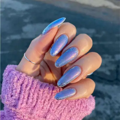 Periwinkle duo-chrome manicure with sparkly accents
