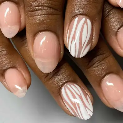 Zebra and nude nails