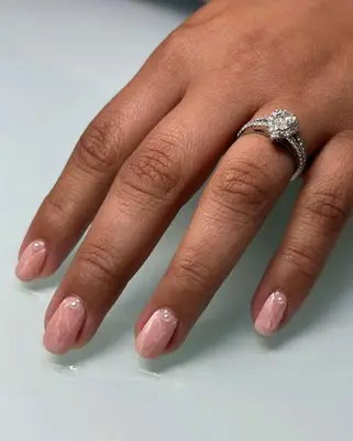 short pink quartz nails with pearl details