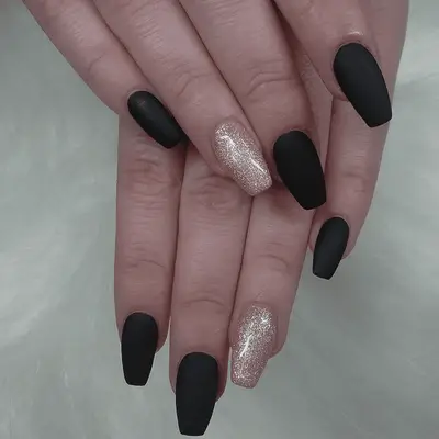 Clear nails with abstract black design and gold stud border accent nail